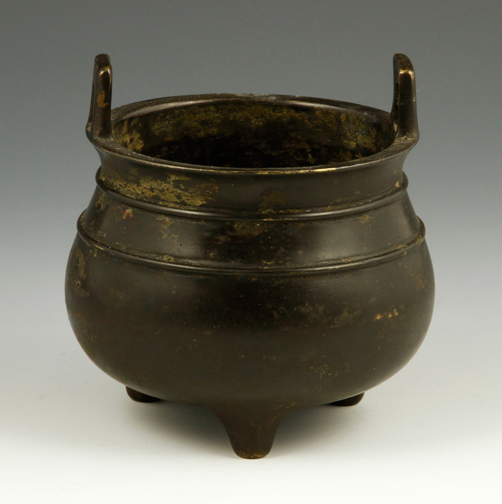 Appraisal: - Chinese Bronze Censer Bronze censer China with three feet