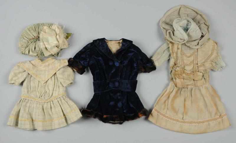 Appraisal: Lot of Antique Doll Clothing Cotton print dress with dropped