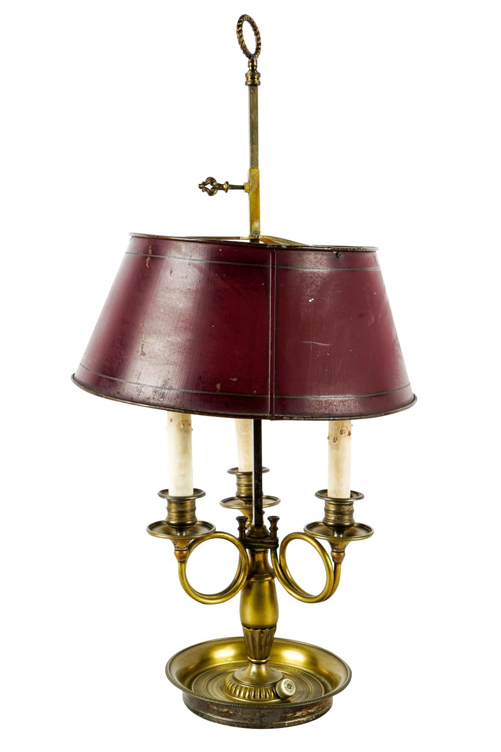 Appraisal: BOUILLOTTE LAMPwith red-painted tole shade over three candle arms wired