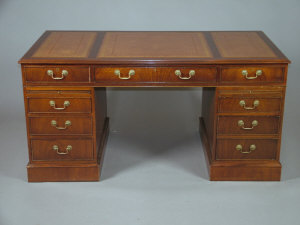 Appraisal: A reproduction mahogany twin pedestal desk late th century with