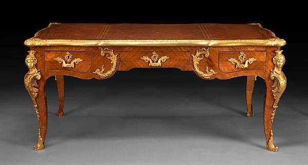 Appraisal: A Louis XV style gilt metal mounted walnut bureau plat