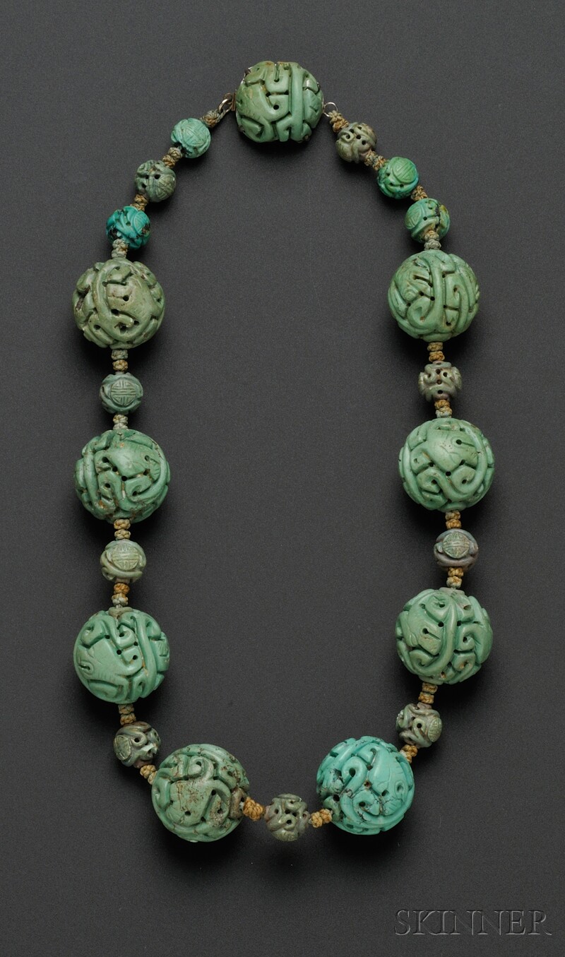 Appraisal: Chinese Carved Turquoise Bead Necklace composed of eight large beads