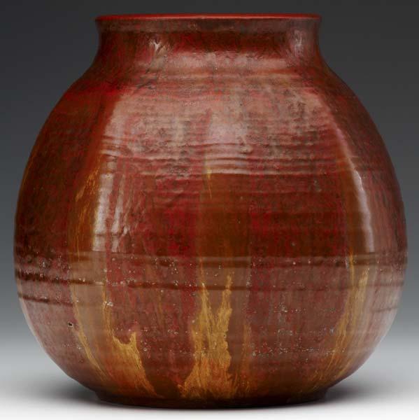 Appraisal: ARTHUR BAGGS Faceted vase covered in orange amber and yellow