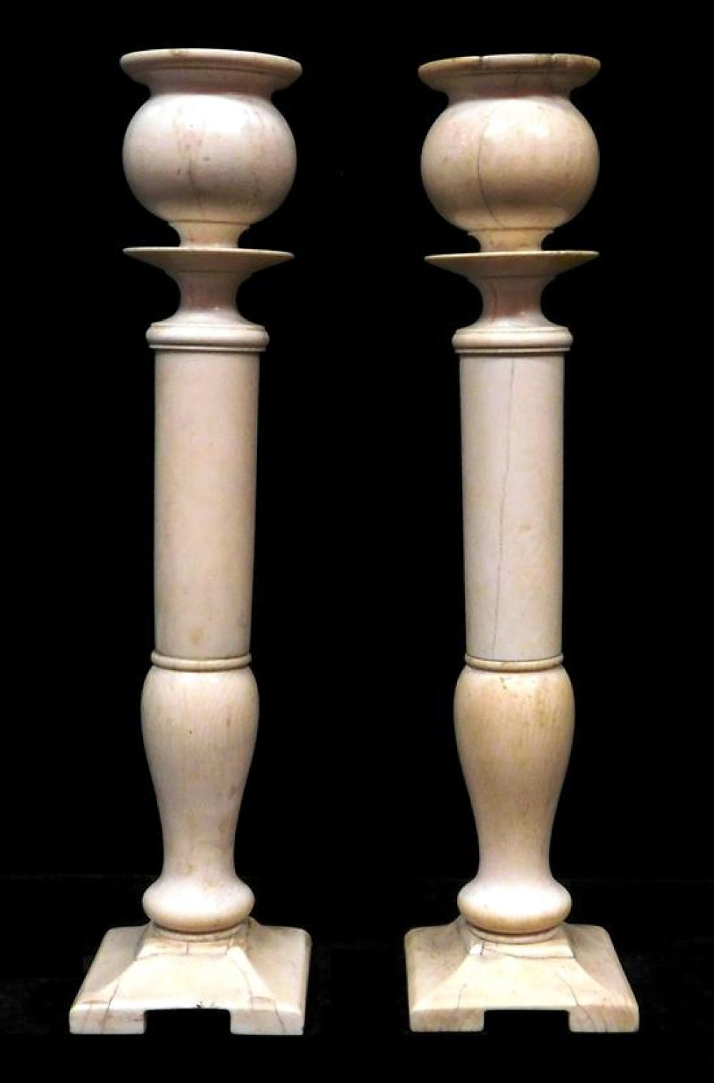 Appraisal: Pair of ivory candlesticks Continental antique possibly th C urn