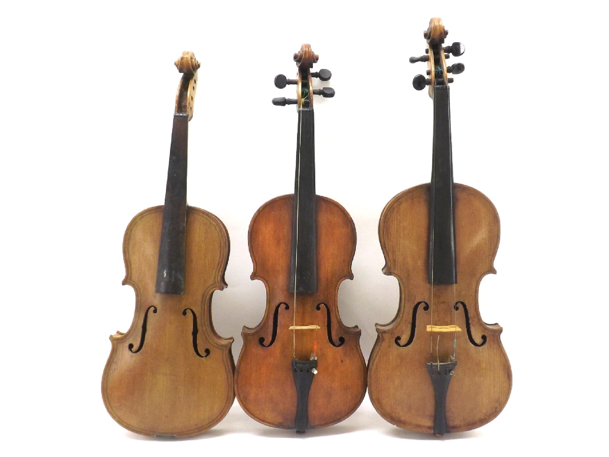 Appraisal: Late th century German violin also a three-quarter size Maggini