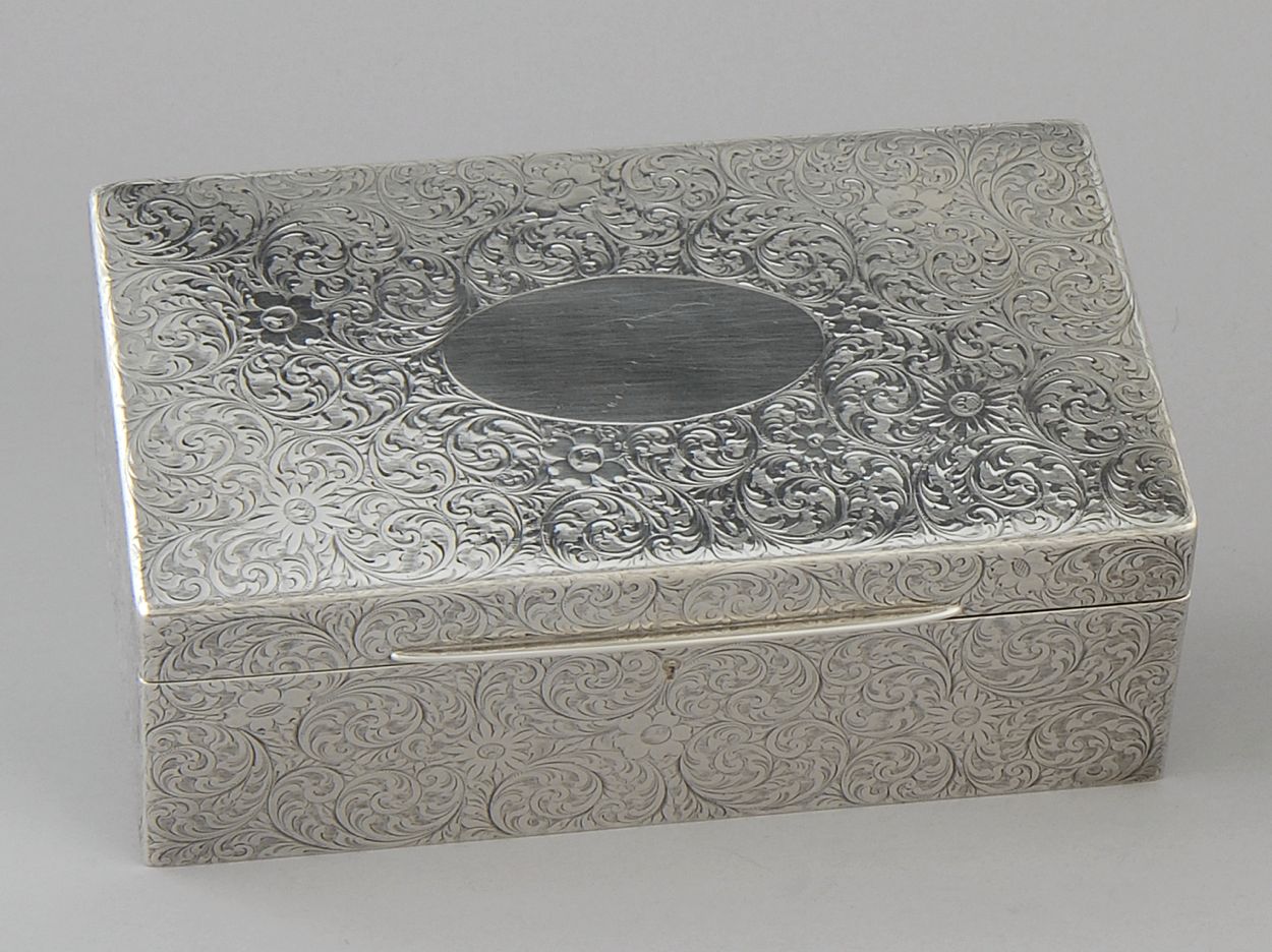 Appraisal: TIFFANY STERLING SILVER CIGAR BOX With allover engraved scroll and