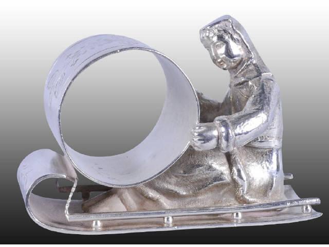 Appraisal: Hooded Woman on Toboggan Figural Napkin Ring Description Marked Rogers