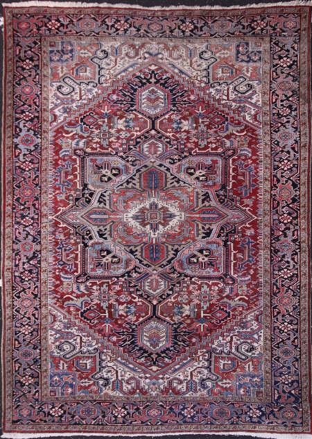 Appraisal: HERIZ CARPET NORTHWEST PERSIA LATE TH CENTURY the red field