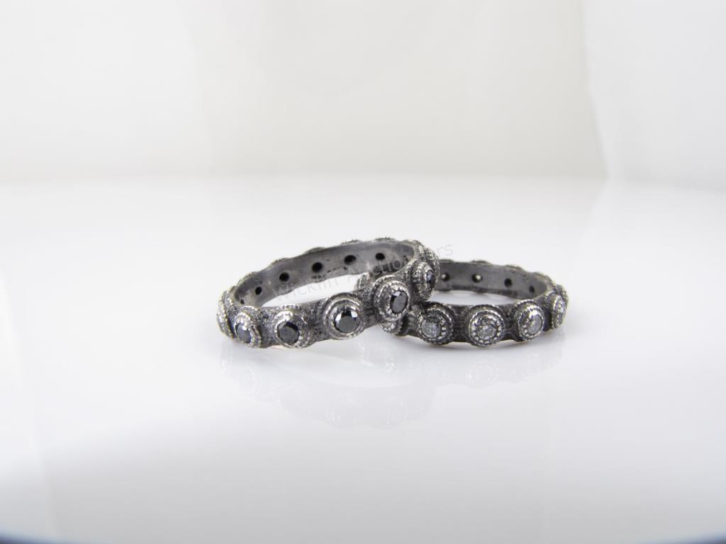 Appraisal: A pair of sterling silver eternity stack rings one with