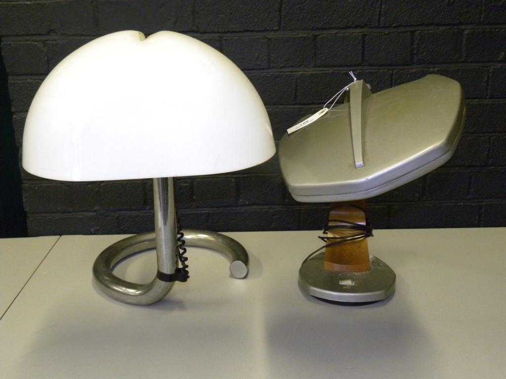 Appraisal: A Modernist chromium plated tubular table lamp with opaque white