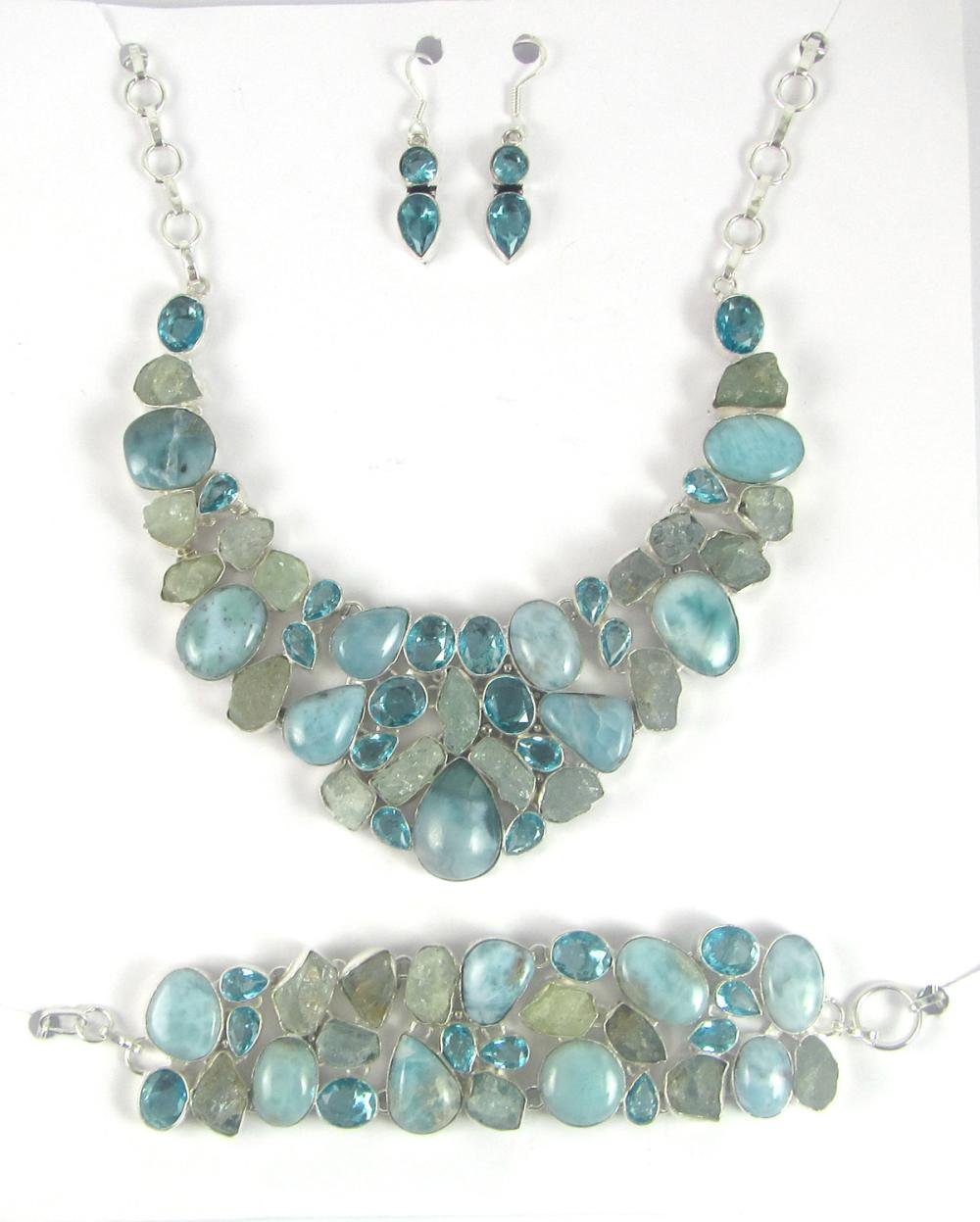 Appraisal: AQUAMARINE BLUE TOPAZ AND LARIMAR JEWELRY SET including a sterling