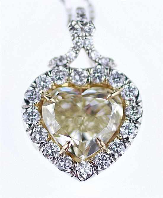 Appraisal: Fancy yellow diamond heart-shaped pendant on chain ct heart modified