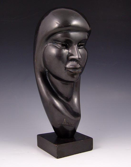 Appraisal: ARIAS Flores Mexican th C Carved and Ebonized Female Head