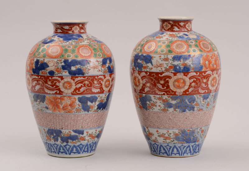 Appraisal: PAIR OF JAPANESE IMARI PORCELAIN LARGE VASES Each ovoid bowl