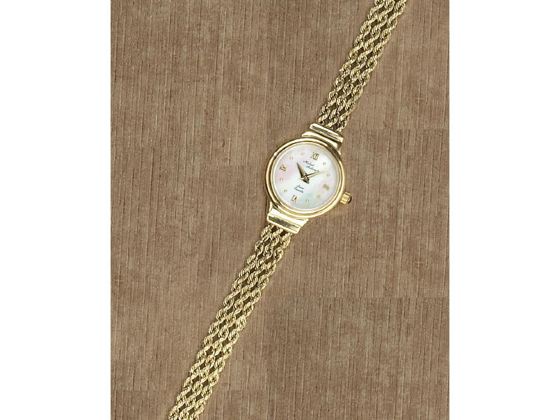 Appraisal: GOLD WATCH k Michael Anthony lady's watch mother of pearl