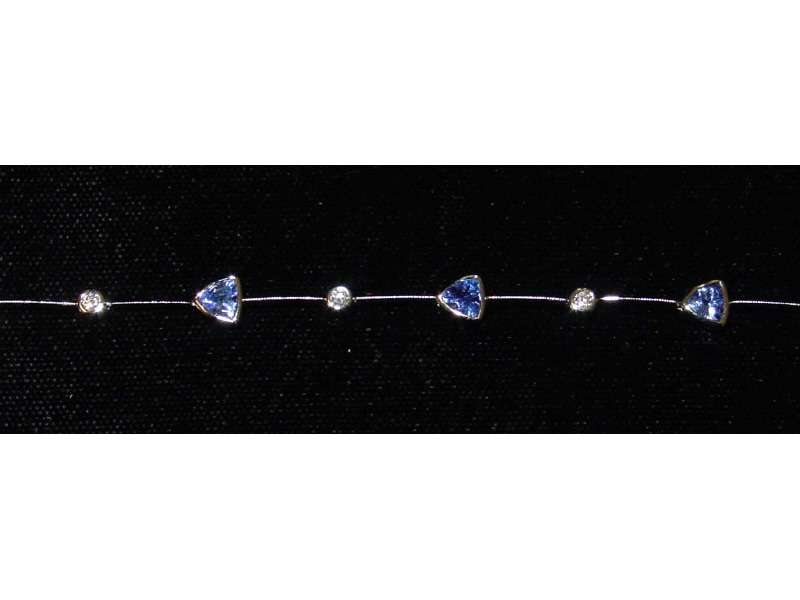 Appraisal: TANZANITE BRACELET k white gold set with seven triangular faceted