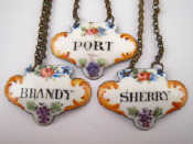 Appraisal: Three antique enamel wine labels for Port Sherry and Brandy