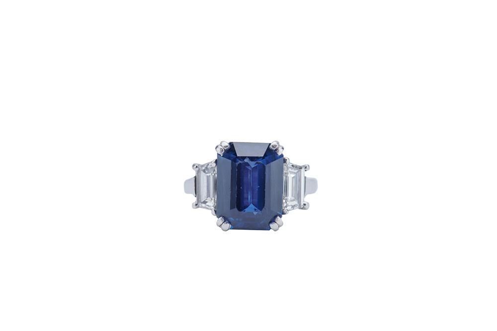 Appraisal: Platinum Sapphire and Diamond Ring centering an emerald-cut sapphire weighing