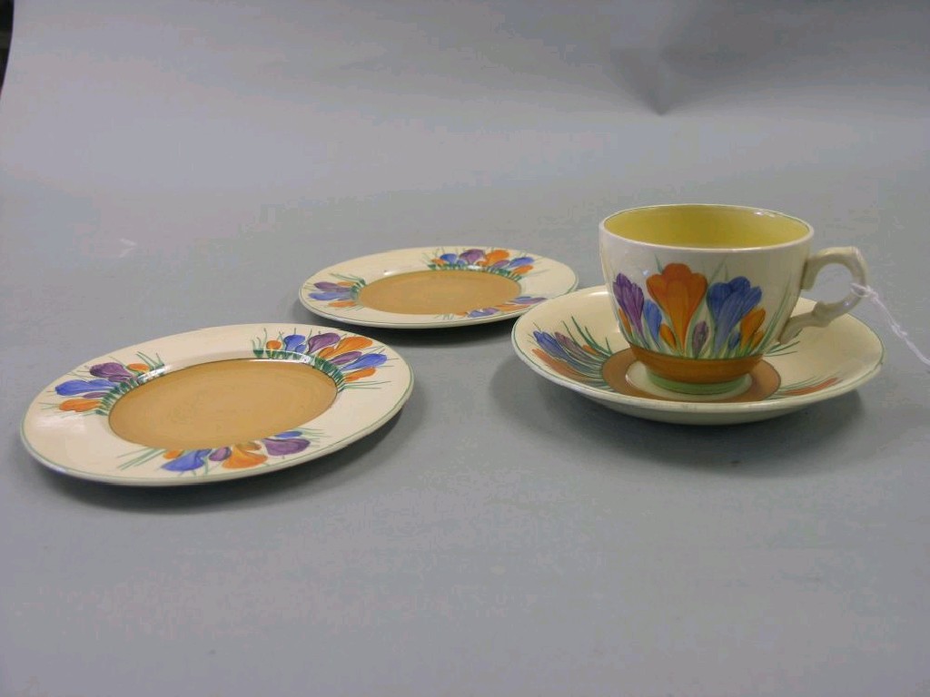 Appraisal: A Clarice Cliff trio 'Crocus' consisting of teacup saucer and