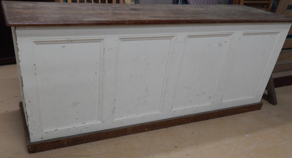 Appraisal: A mahogany and pine shop type counter the top with