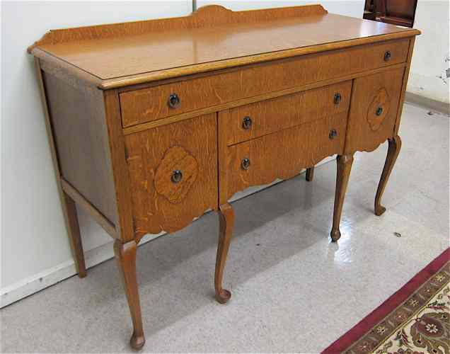 Appraisal: AN OAK QUEEN ANNE REVIVAL SIDEBOARD American c Dimensions ''H