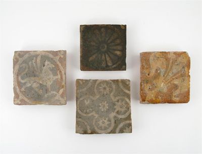 Appraisal: Four medieval pottery encaustic tiles variously decorated with a griffin