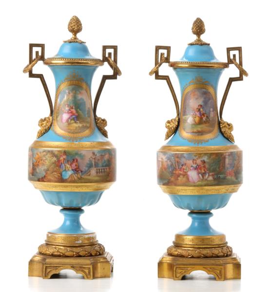 Appraisal: SEVRES STYLE FRENCH PORCELAIN AND GILT BRONZE URNSThe celeste blue