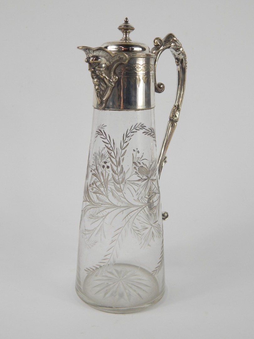 Appraisal: A Victorian cut glass claret jug with an engraved plated