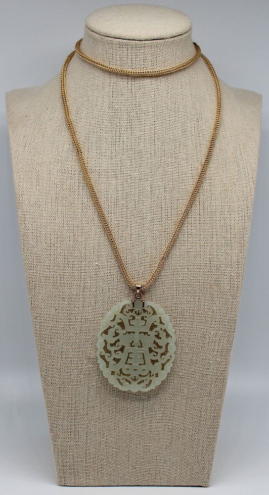 Appraisal: JEWELRY Celadon Jade Carving and kt Gold Chain Includes an