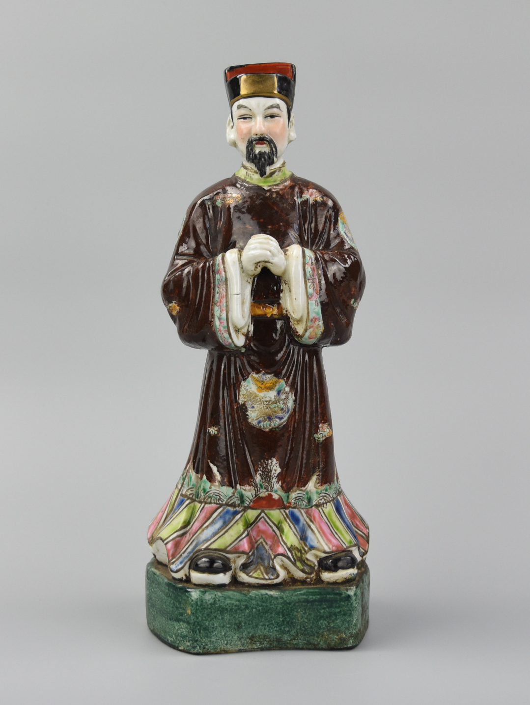 Appraisal: CHINESE FIGURE OF AN OFFICIAL HANDS FOLDED TH C A