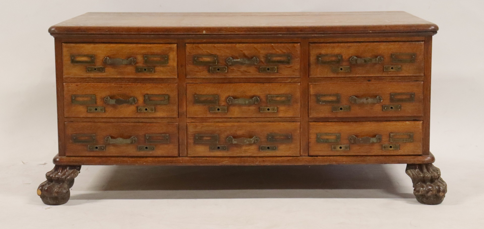 Appraisal: VICTORIAN GOLDEN OAK MULTI DRAWER CABINET Raised on ball and