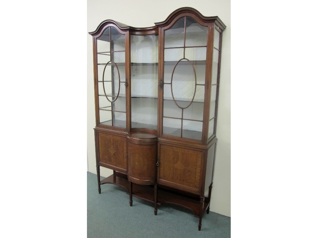 Appraisal: An Edwardian mahogany inlaid display cabinet the arched top raised