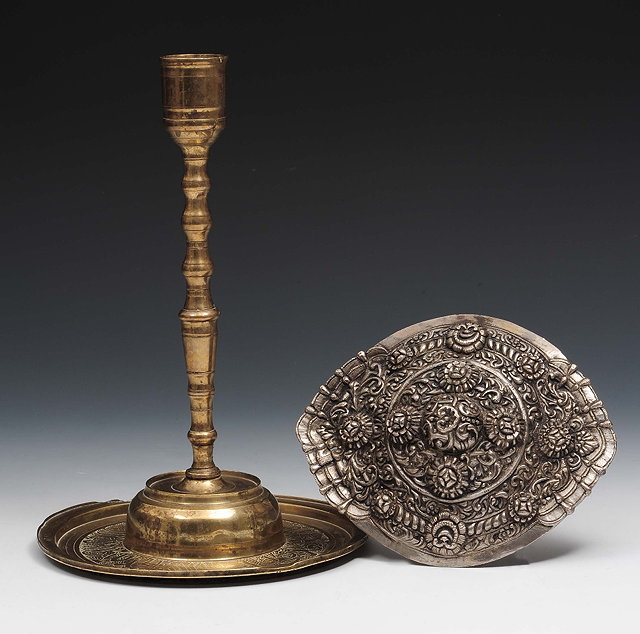 Appraisal: An ottoman brass engraved candlestick th Century cm and a