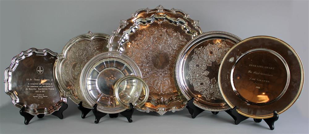 Appraisal: SEVEN SILVERPLATED CIRCULAR SALVERS AND TRAYS Provenance Estate of Jerry