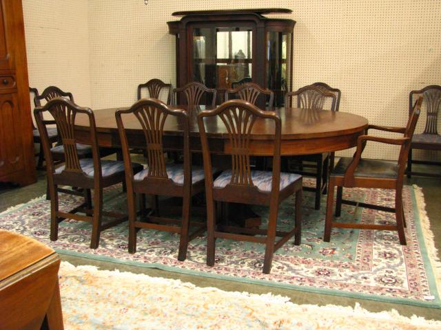 Appraisal: Antique Mahogany Banquet Table and Twelve Chairs '' diameter without