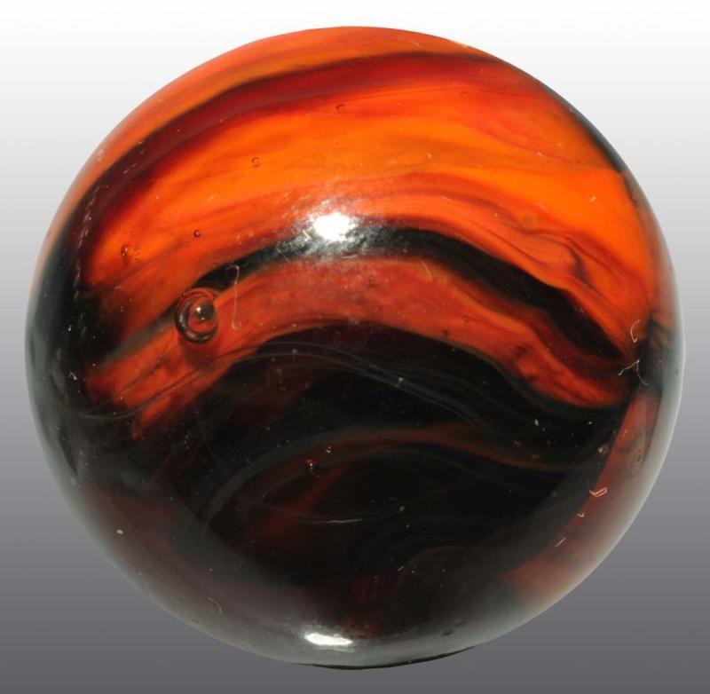 Appraisal: Christensen Agate Company Marble Description Electric orange submarine Condition -