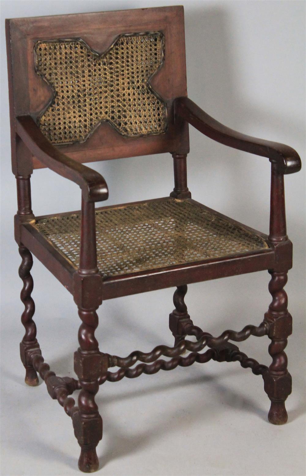 Appraisal: BAROQUE STYLE CANED ARMCHAIR WITH BARLEY TWIST LEGS having a