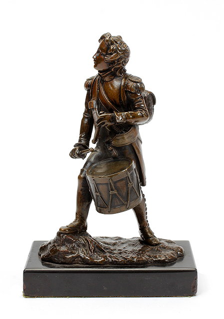 Appraisal: AN ANTIQUE BRONZE SCULPTURE of a military drummer unsigned mounted