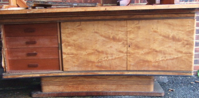 Appraisal: An Art Deco satin birch concave fronted sideboard cm wide