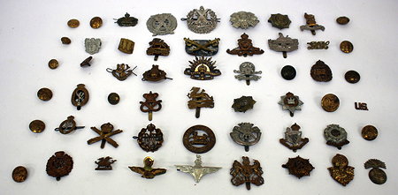 Appraisal: A COLLECTION OF WORLD WAR II AND LATER CAP BADGES