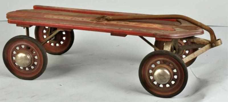 Appraisal: Pressed Steel Garton Sled Wagon Pedal Toy Description s Wood