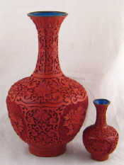 Appraisal: Two Chinese incised red lacquer vases one cm one cm