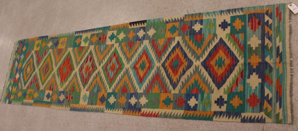 Appraisal: HAND WOVEN KILIM FLATWEAVE RUNNER multicolor geometric pattern ' x