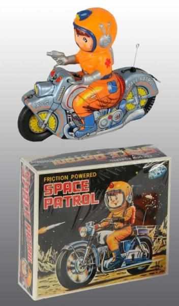 Appraisal: Tin Space Patrol Motorcycle Battery-Op Toy Description Japanese Working Vinyl