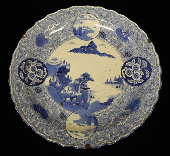 Appraisal: ASIAN Chinese blue and white round platter scalloped rim central