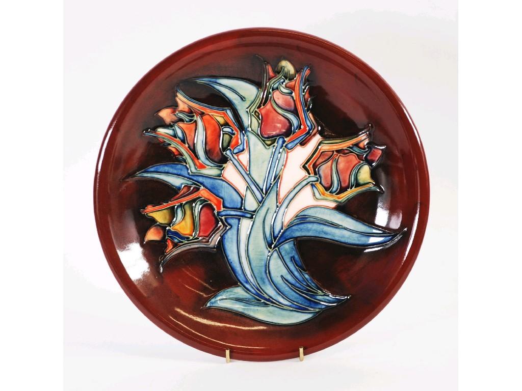 Appraisal: MODERN MOORCROFT 'TULIP ' PATTERN TUBE LINED POTTERY PLAQUE decorated