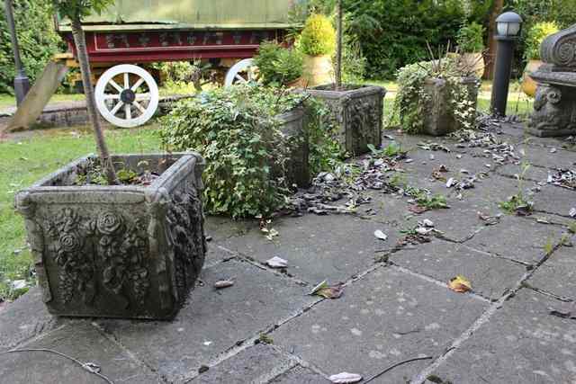 Appraisal: A GROUP OF SIX HADDONSTONE CUBOID PLANTERS each with ribbon