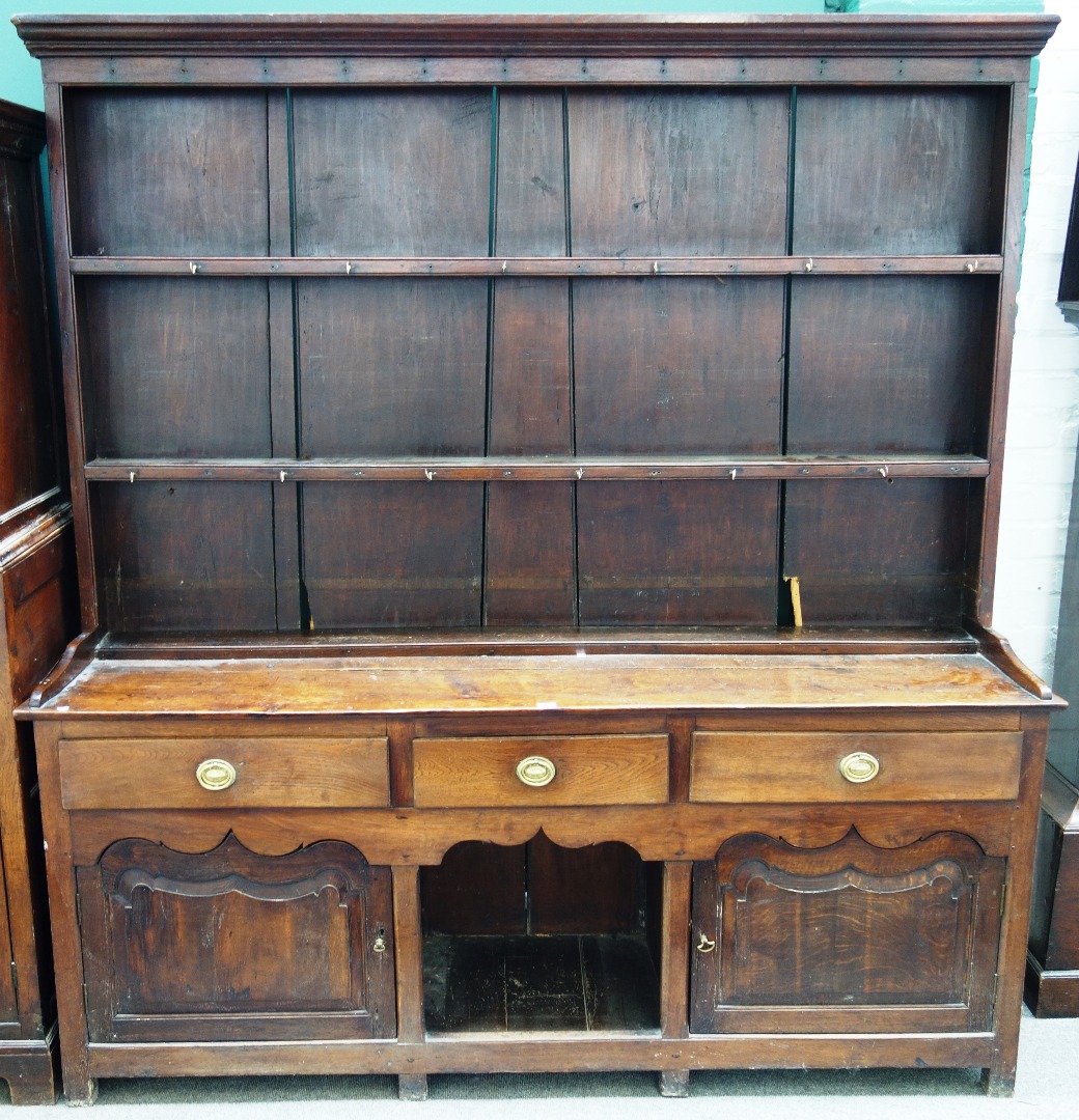 Appraisal: An th century and later oak dresser the enclosed three