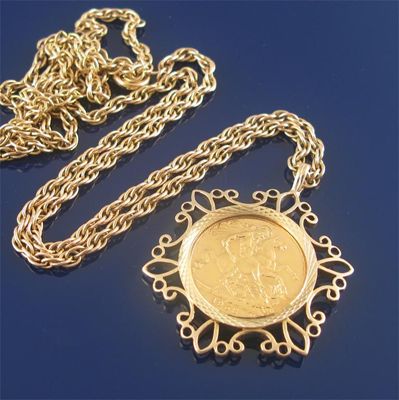 Appraisal: A gold framed sovereign pendant on a gold neck chain