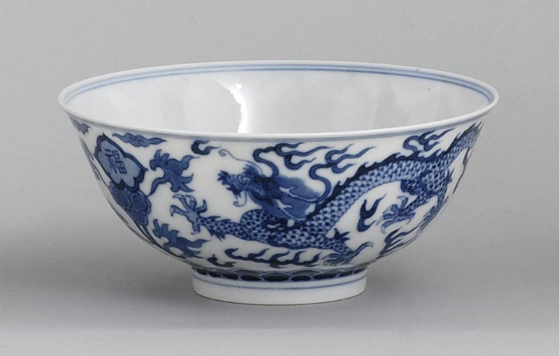 Appraisal: UNDERGLAZE BLUE PORCELAIN BOWL In bell form with five-claw dragon